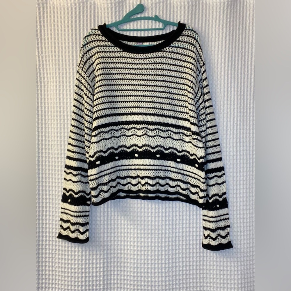 Knitted long sleeved top
